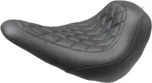 Mustang Wide Tripper™ Seat<br><ul><li>High-quality expanded vinyl cover combines the appearance of leather with the durability to withstand the elements</li><li>Matching passenger seat offers a spacious 10” width for passengers and is 2.5” wider than stock passenger area</li><li>Sits the rider slightly lower but at a similar reach to controls compared to stock</li><li>Cut narrow at the nose so the rider can easily plant their feet on the ground</li></ul>