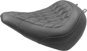 Mustang Wide Tripper™ Seat<br><ul><li>High-quality expanded vinyl cover combines the appearance of leather with the durability to withstand the elements</li><li>Matching passenger seat offers a spacious 10” width for passengers and is 2.5” wider than stock passenger area</li><li>Sits the rider slightly lower but at a similar reach to controls compared to stock</li><li>Cut narrow at the nose so the rider can easily plant their feet on the ground</li></ul>