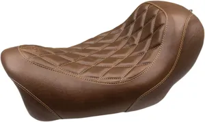 Mustang Wide Tripper™ Seat<br><ul><li>Moves rider 1.5" forward from Wide Tripper™ seat for ease of reaching handlebar and foot controls</li><li>Detailed stitch work in the highly durable, synthetic glove-leather cover</li><li>Seat design lets you ride low and still be comfortable</li><li>Marine-grade fiberglass baseplate</li><li>Made in the USA</li></ul>