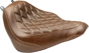 Mustang Wide Tripper™ Seat<br><ul><li>High-quality expanded vinyl cover combines the appearance of leather with the durability to withstand the elements</li><li>Matching passenger seat offers a spacious 10” width for passengers and is 2.5” wider than stock passenger area</li><li>Sits the rider slightly lower but at a similar reach to controls compared to stock</li><li>Cut narrow at the nose so the rider can easily plant their feet on the ground</li></ul>