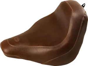 Mustang Wide Tripper™ Seat<br><ul><li>High-quality expanded vinyl cover combines the appearance of leather with the durability to withstand the elements</li><li>Matching passenger seat offers a spacious 10” width for passengers and is 2.5” wider than stock passenger area</li><li>Sits the rider slightly lower but at a similar reach to controls compared to stock</li><li>Cut narrow at the nose so the rider can easily plant their feet on the ground</li></ul>