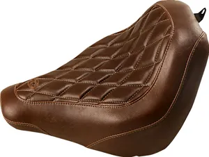Mustang Wide Tripper™ Solo Seat<br><ul><li>Detailed stitch work in the highly durable, synthetic glove leather cover</li><li>Seat design lets you ride low and still be comfortable</li><li>Marine-grade fiberglass baseplate</li><li>Made in the USA</li></ul>