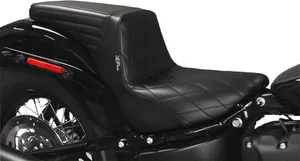 Le Pera Kickflip Seat<br><ul><li>Base plate is powder-coated steel and carpeted to protect painted surfaces</li><li>Featuring LePera's molded Marathon Foam for maximum stability and comfort</li><li>Handcrafted with LePera's iconic attention to detail</li><li>Top-grade black vinyl cover</li><li>Made in the U.S.A.</li></ul>