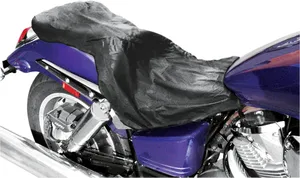 Saddlemen Explorer Seat Rain Cover with Backrest Rain Cover<br><ul><li>Black nylon covers are polyurethane-backed for water resistance</li><li>Easy to install</li><li>Folds compact; stores in convenient storage bag</li><li>Feature tabs sewn into the main cover that insert between the seat and body panels to ensure a secure and tight fit, even in heavy wind</li></ul><br>Folds into itself for storage; does not include separate storage bag.
For Harley-Davidson two-up seats except FLST/FLSTS. Fits up to 38" L x 14" W