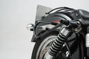 SW-Motech SLC Side Carrier<br><ul><li>Side carrier adapts perfectly to your motorcycle's look</li><li>Bike-specific development ensures the best fit and allows you to mount it either on one or two sides</li><li>Compatible with Legend Gear LC1/LC2 side bags, URBAN ABS side cases, SysBag with adapter plate, universal side bracket, number plate</li><li>The adapter kit is included in delivery</li><li>Included in delivery</li><li>1 x SLC Side carrier</li><li>Mounting instructions</li><li>Mounting material</li><li> Stainless Steel</li></ul>