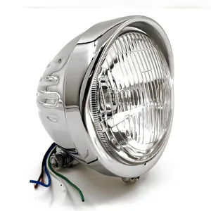 Zodiac (Genuine Zodiac Products) CHROME SPRINGER STYLE HEADLIGHT, LATE MODEL WITH GROOVES AND VISOR
